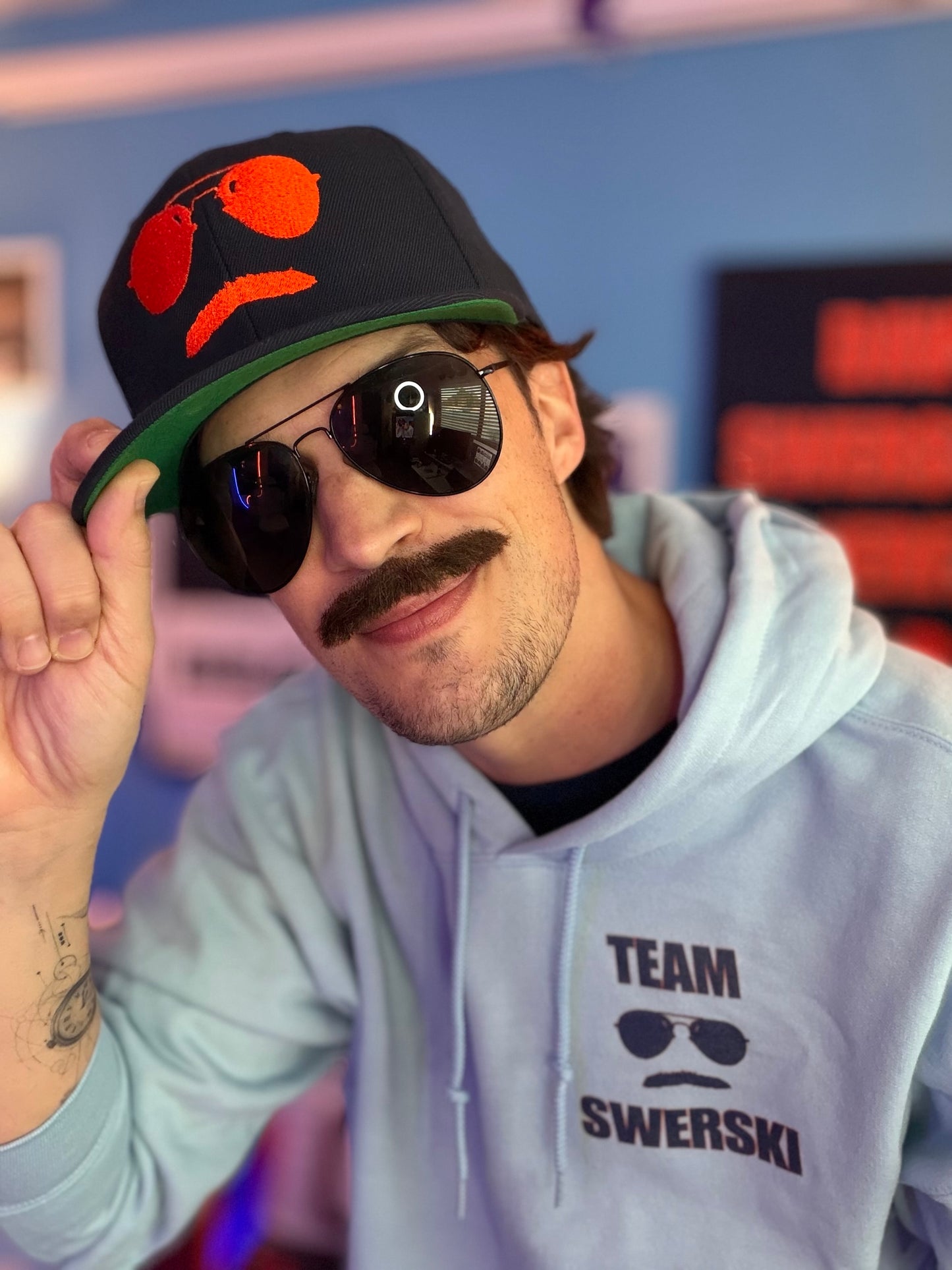 Swerski Stache and Shades Logo Snapback Hat - Navy with Orange Logo